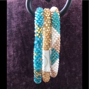 Aid Through Trade roll on bracelets